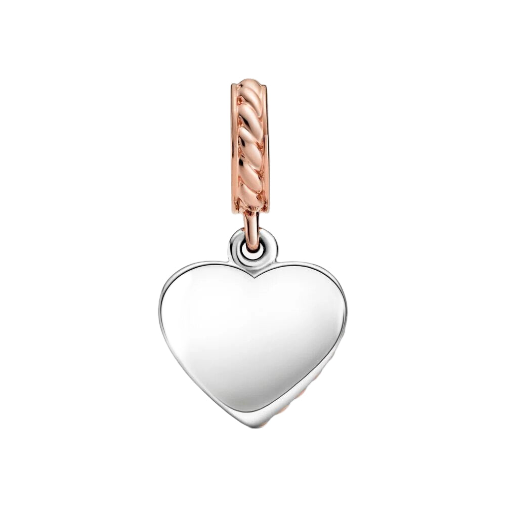 Heart-shaped pendant with rose gold and silver accents on a white background