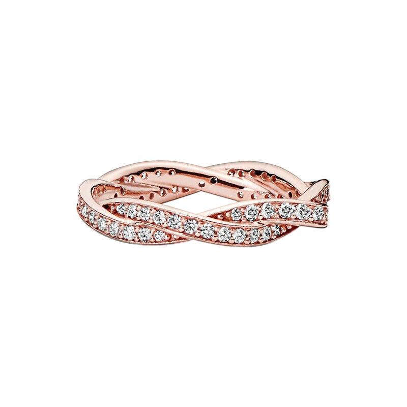 Rose gold ring with diamond accents on a white background