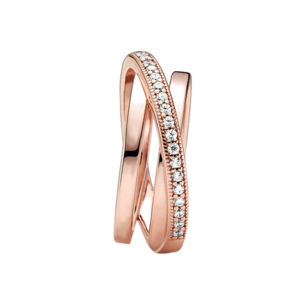Rose gold ring with diamond accents on a white background