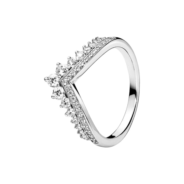 Silver ring with diamond accents on a white background